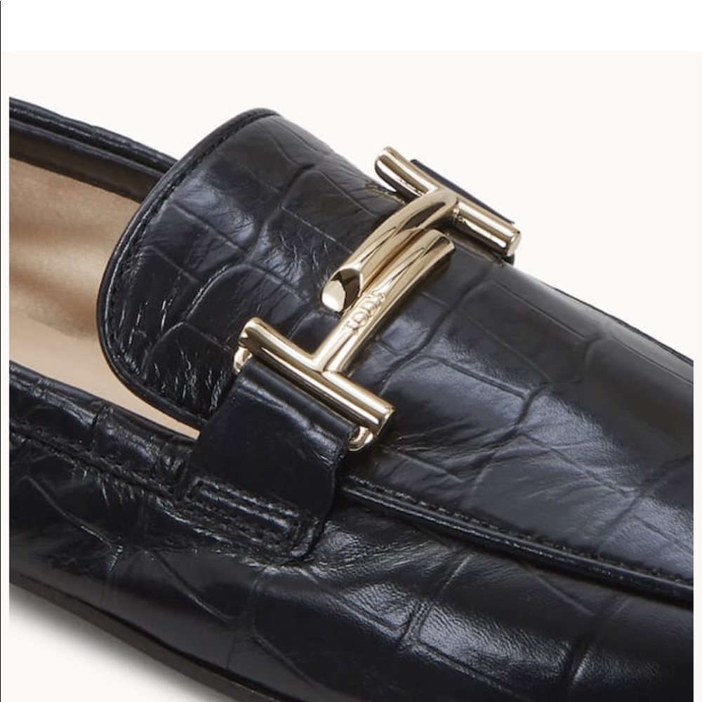 Black crocodile Tods loafers with gold buckle